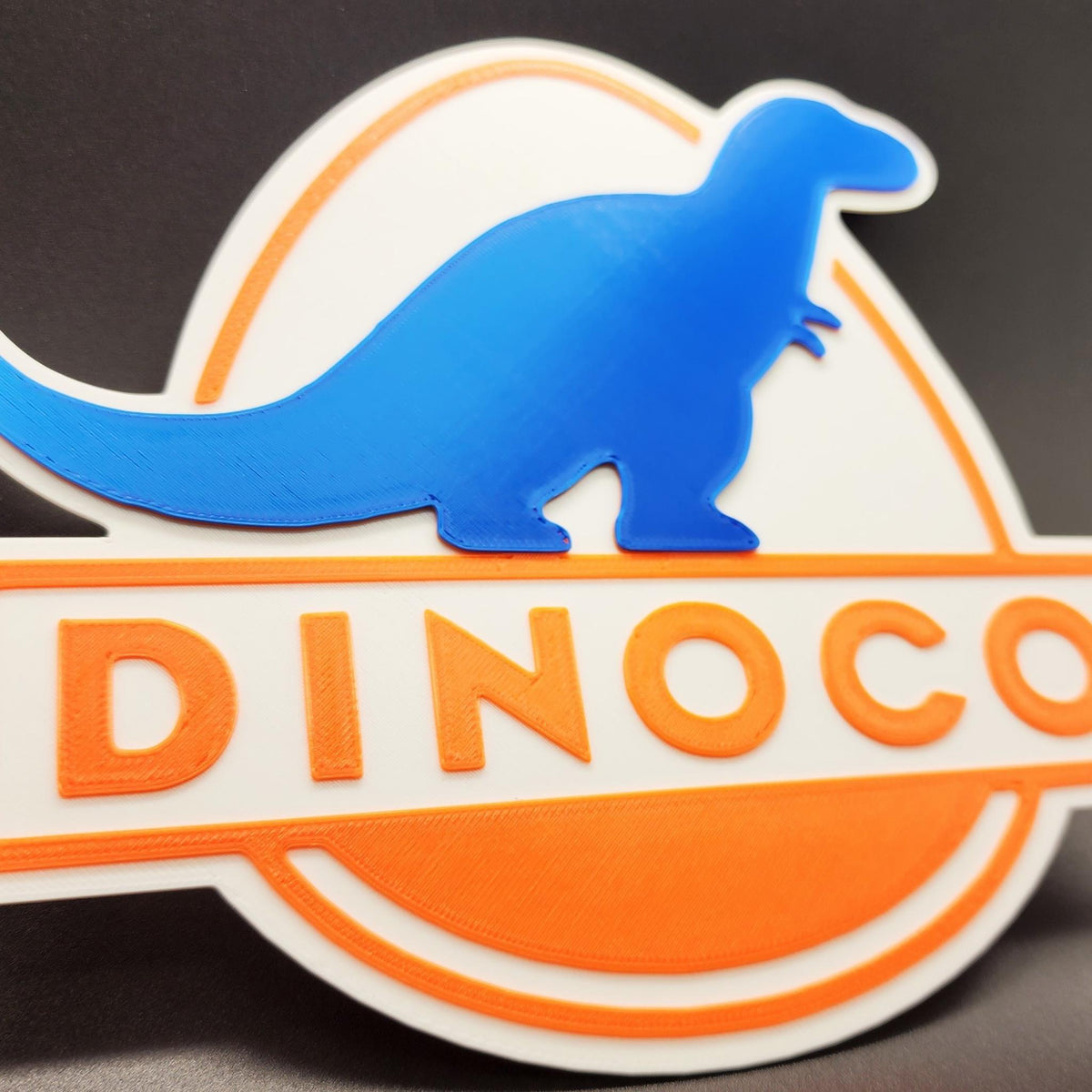Retro Racing Dinosaur Wall Sign • Classic Motorsport Inspired Decor • Garage, Office or Gaming Room Display - MoreMiniaturesStudio