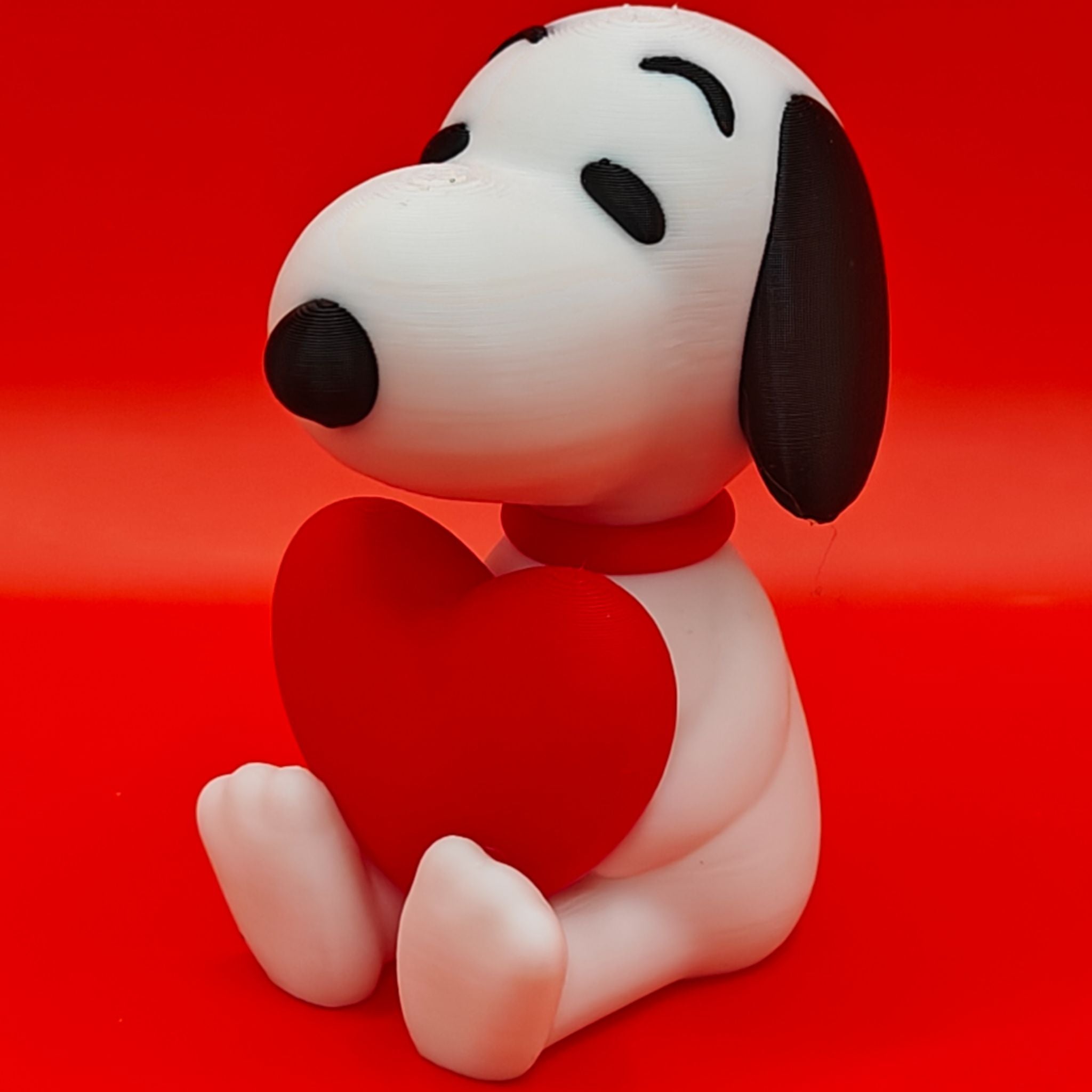 Snoopy Holding a Heart