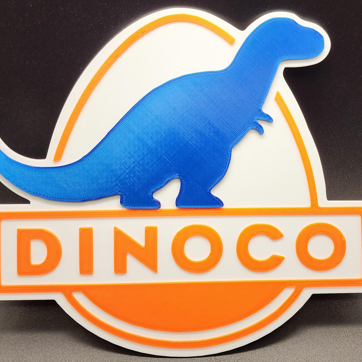 Retro Racing Dinosaur Wall Sign • Classic Motorsport Inspired Decor • Garage, Office or Gaming Room Display - MoreMiniaturesStudio