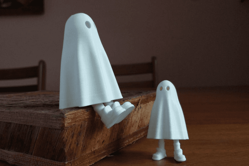 Cute Ghost Figure with Retractable Leg – Spooky Desk Toy