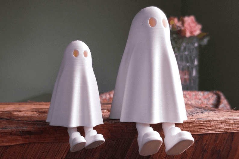 Cute Ghost Figure with Retractable Leg – Spooky Desk Toy