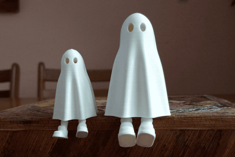 Cute Ghost Figure with Retractable Leg – Spooky Desk Toy