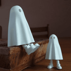 Cute Ghost Figure with Retractable Leg – Spooky Desk Toy